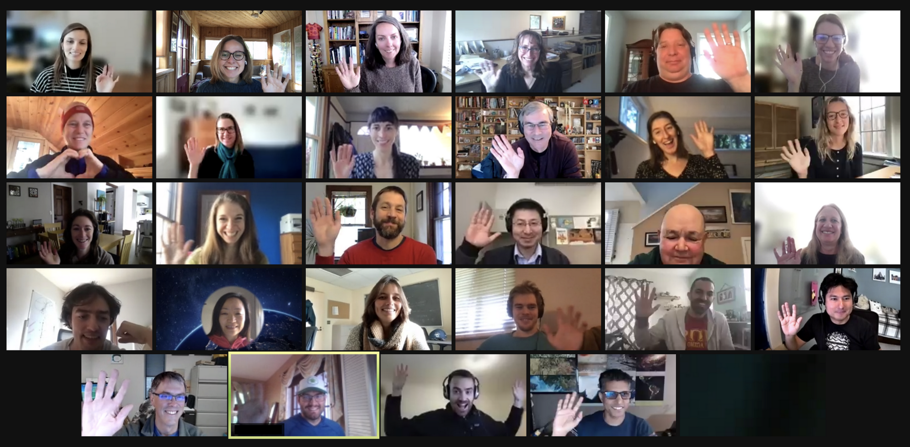 Screenshot of a Zoom meeting with 30 smiling faces